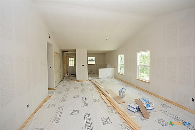 439 Deer Crk, Spring Branch, TX 78070 - bathroom with lofted ceiling and baseboards