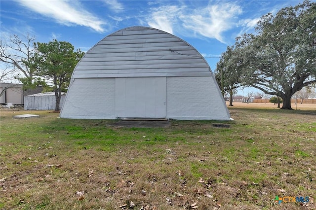 garage with a yard