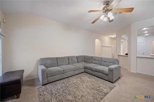 104 Missouri Dr, Harker Heights, TX 76548 - living room with carpet floors, arched walkways, a ceiling fan, lofted ceiling, and baseboards