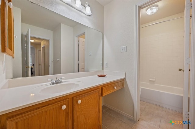 104 Missouri Dr, Harker Heights, TX 76548 - full bathroom with vanity, tile patterned flooring, toilet, baseboards, and tub / shower combination
