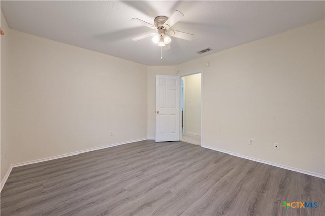 104 Missouri Dr, Harker Heights, TX 76548 - unfurnished room with wood finished floors, ceiling fan, and baseboards