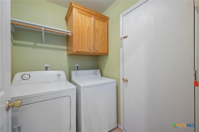 104 Missouri Dr, Harker Heights, TX 76548 - laundry room with washer and clothes dryer and cabinet space