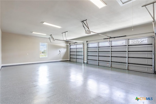 104 Hondo Vis, La Vernia, TX 78121 - garage with a garage door opener and baseboards