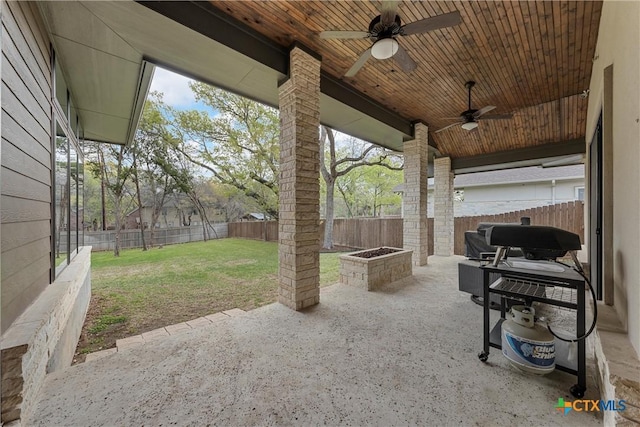 view of patio featuring ceiling fan