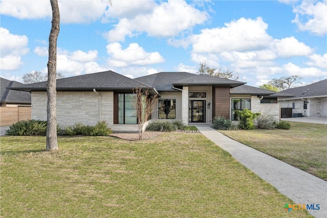 view of front of house with a front lawn