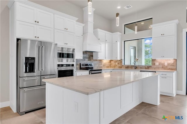 6846 Spring Branch Rd, Spring Branch, TX 78070 - kitchen with stainless steel appliances, tasteful backsplash, white cabinets, and recessed lighting
