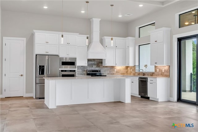 6846 Spring Branch Rd, Spring Branch, TX 78070 - kitchen featuring appliances with stainless steel finishes, backsplash, light countertops, white cabinetry, and recessed lighting