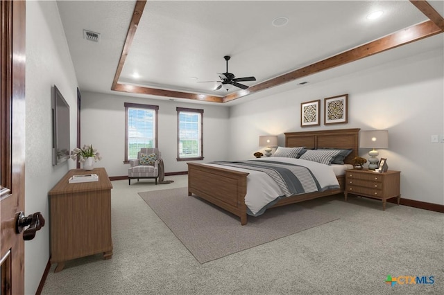 12491 Madison Ln, Justin, TX 76247 - carpeted bedroom with baseboards, a tray ceiling, ceiling fan, and recessed lighting
