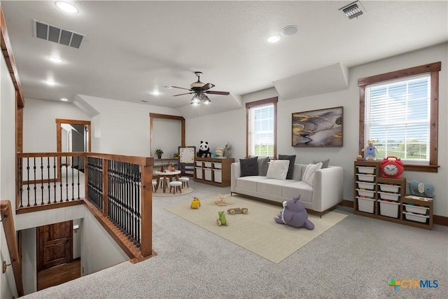 12491 Madison Ln, Justin, TX 76247 - carpeted living area with ceiling fan and recessed lighting