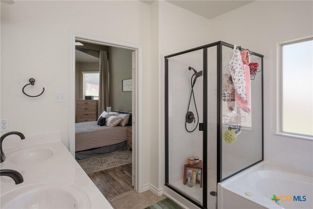 3608 Quail Ridge Dr, Harker Heights, TX 76548 - bathroom featuring a sink, a shower stall, a garden tub, and ensuite bathroom
