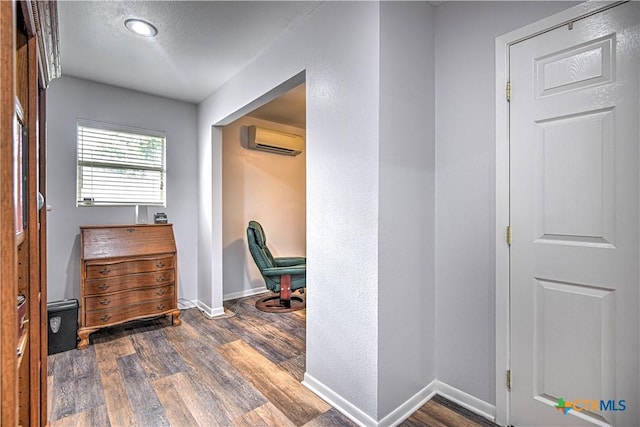 3117 Magnolia Blvd, Temple, TX 76502 - hall with a wall unit AC and dark wood finished floors
