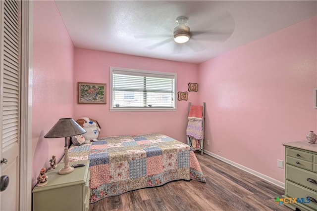 3117 Magnolia Blvd, Temple, TX 76502 - bedroom featuring wood finished floors and a ceiling fan