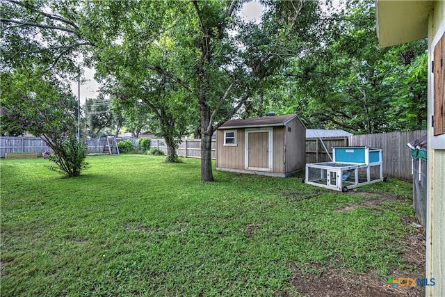3117 Magnolia Blvd, Temple, TX 76502 - fenced backyard with a storage unit