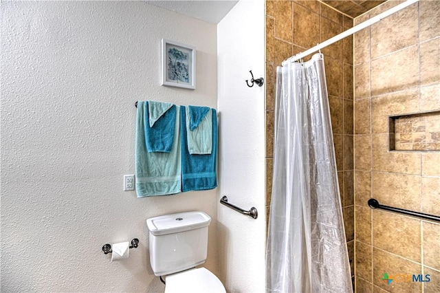3117 Magnolia Blvd, Temple, TX 76502 - full bathroom with toilet and tiled shower