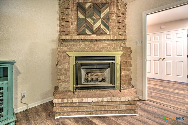 3117 Magnolia Blvd, Temple, TX 76502 - detailed view of wood finished floors and a fireplace