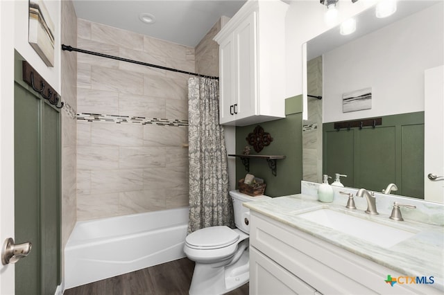 127 Diamond Head Dr, Bastrop, TX 78602 - full bathroom with vanity, shower / bath combo, toilet, and wood finished floors