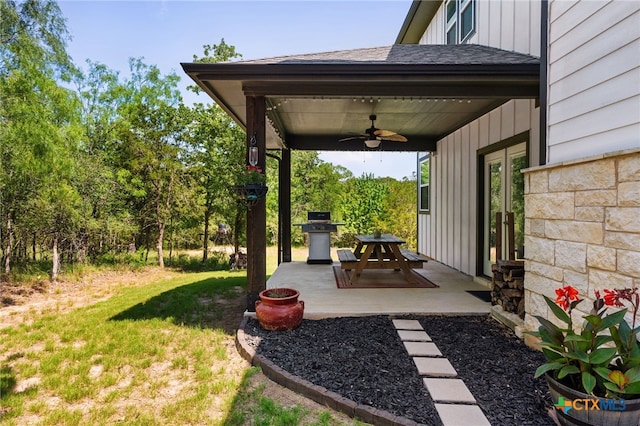 127 Diamond Head Dr, Bastrop, TX 78602 - view of grassy yard featuring a ceiling fan, a patio, and french doors