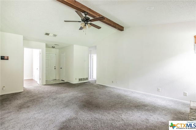 carpeted spare room featuring ceiling fan, a textured ceiling, and vaulted ceiling with beams