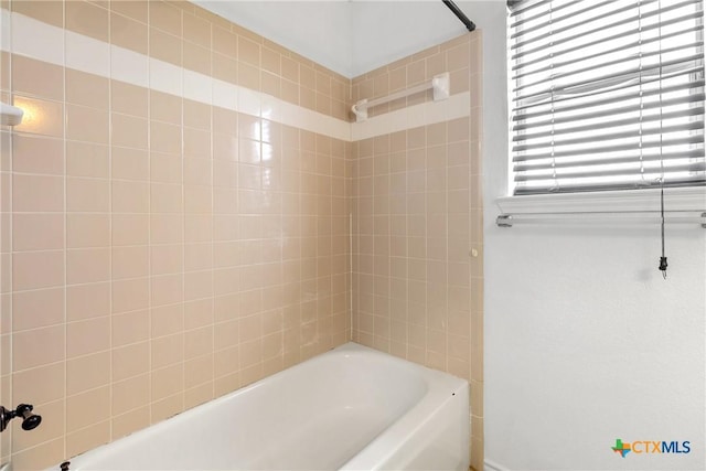 bathroom with shower / bathtub combination