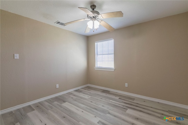 unfurnished room featuring light hardwood / wood-style floors