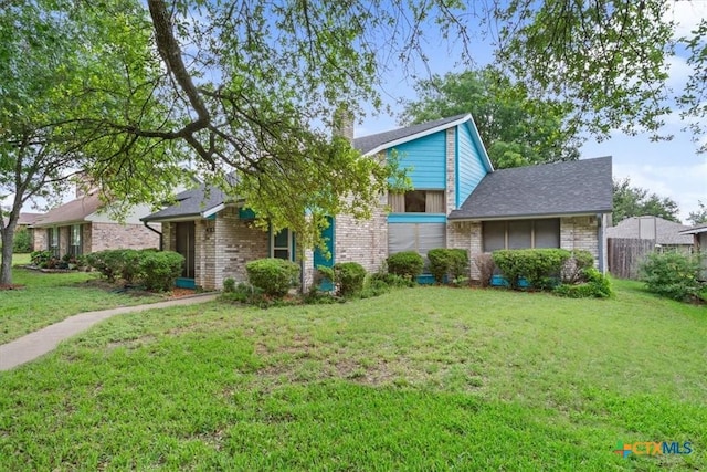 4313 Lone Star Trl, Temple, TX 76502 - mid-century home featuring brick siding and a chimney