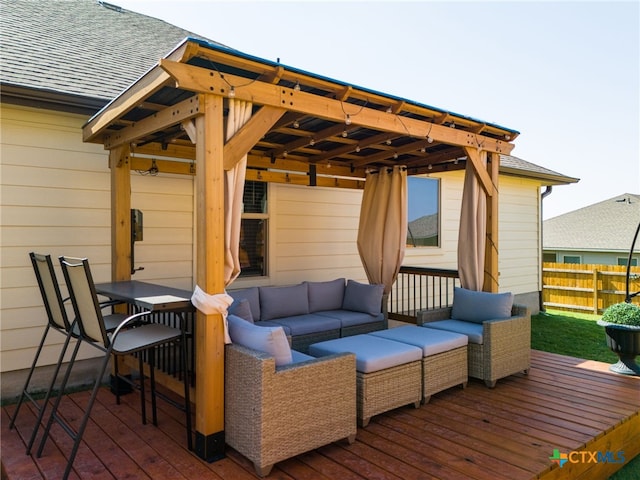 deck featuring an outdoor living space and a gazebo