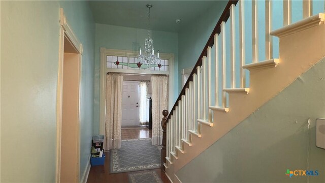 400 S Main St, Belton, TX 76513 - foyer entrance featuring a chandelier, stairs, and wood finished floors