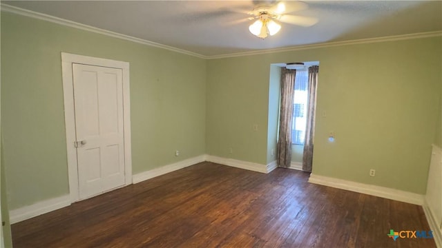 400 S Main St, Belton, TX 76513 - unfurnished room with dark wood-type flooring, ceiling fan, and crown molding