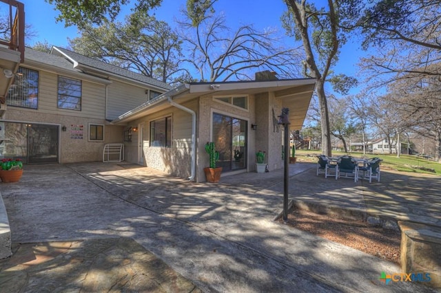 rear view of house featuring a patio area