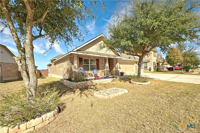 view of front facade featuring a front lawn and a garage