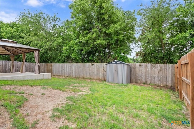 610 Hobby Rd, Copperas Cove, TX 76522 - view of yard with a gazebo, an outbuilding, a fenced backyard, and a storage unit