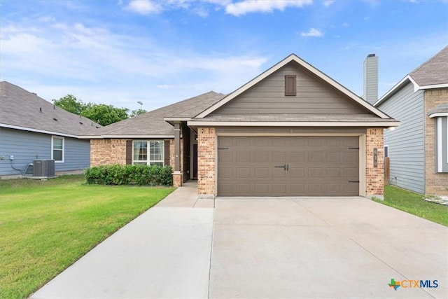 610 Hobby Rd, Copperas Cove, TX 76522 - ranch-style house with central AC, brick siding, a garage, and concrete driveway