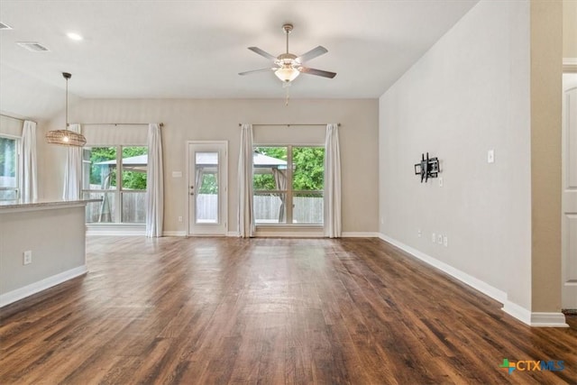 610 Hobby Rd, Copperas Cove, TX 76522 - unfurnished living room with plenty of natural light, dark wood-type flooring, baseboards, and a ceiling fan