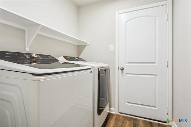 610 Hobby Rd, Copperas Cove, TX 76522 - laundry area with laundry area, dark wood-type flooring, baseboards, and washing machine and clothes dryer