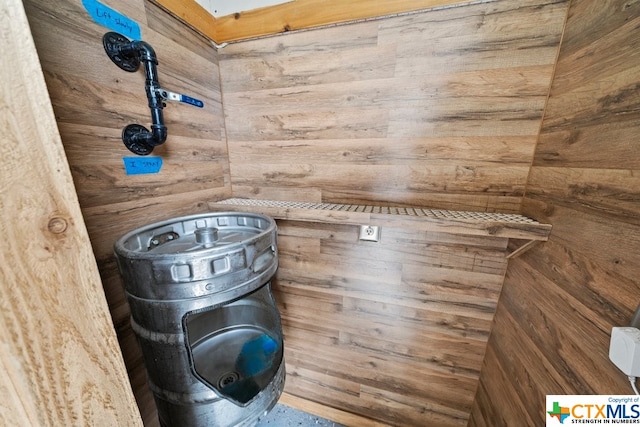 view of sauna / steam room with wooden walls