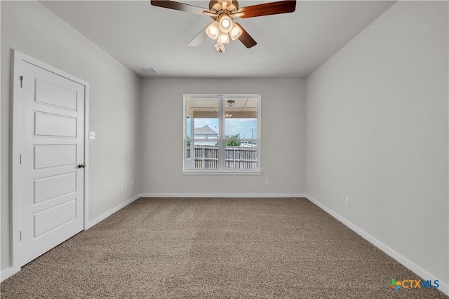 1531 Hillside Dr, Temple, TX 76502 - unfurnished room featuring a ceiling fan, carpet flooring, and baseboards