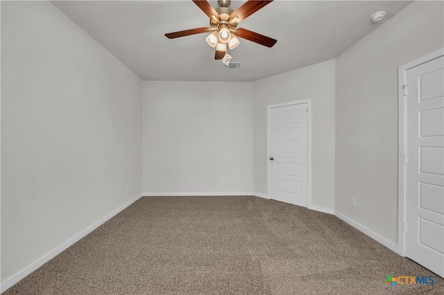 1531 Hillside Dr, Temple, TX 76502 - carpeted empty room featuring a ceiling fan, a smoke detector, and baseboards