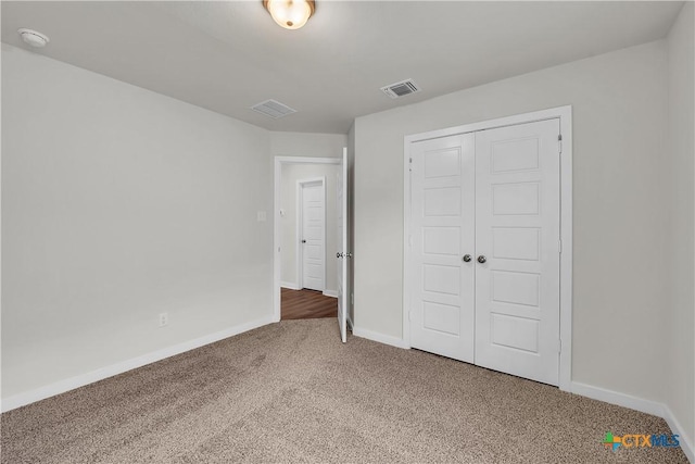 1531 Hillside Dr, Temple, TX 76502 - unfurnished bedroom featuring carpet, baseboards, and a closet