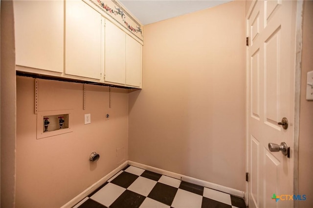 laundry room featuring hookup for an electric dryer, cabinets, and washer hookup