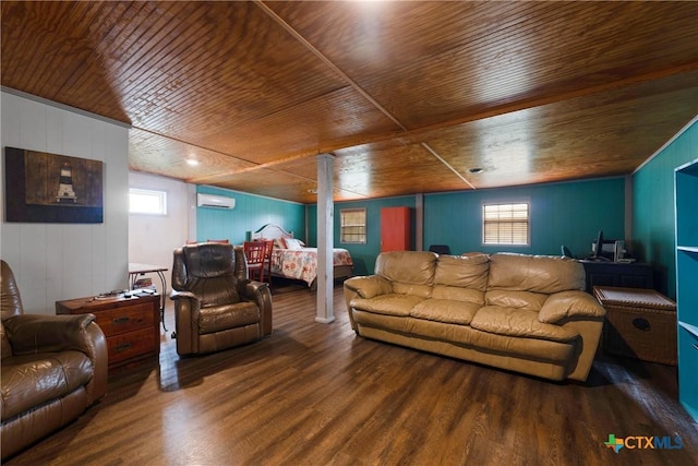 725 Baffin Dr, Port Mansfield, TX 78598 - living area featuring wood ceiling, a wall mounted AC, and wood finished floors