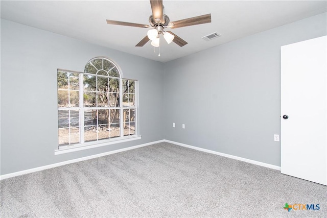 13989 Indian Bluff Rd, Temple, TX 76502 - carpeted empty room with a ceiling fan and baseboards