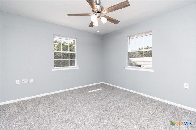 unfurnished room featuring carpet flooring and ceiling fan