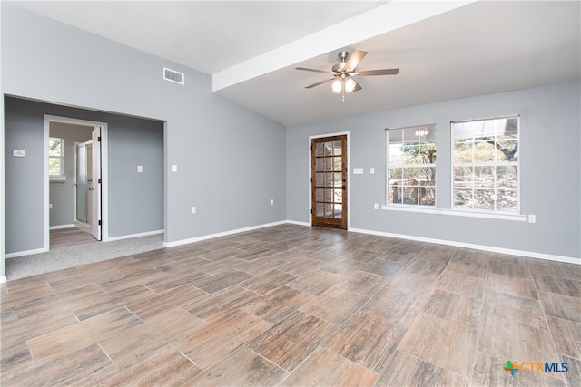 spare room featuring hardwood / wood-style floors and ceiling fan