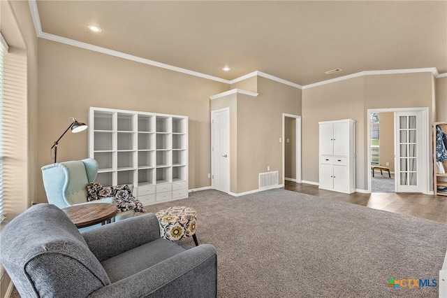 1205 Bowen Ave, Copperas Cove, TX 76522 - living area with carpet floors, ornamental molding, baseboards, and recessed lighting