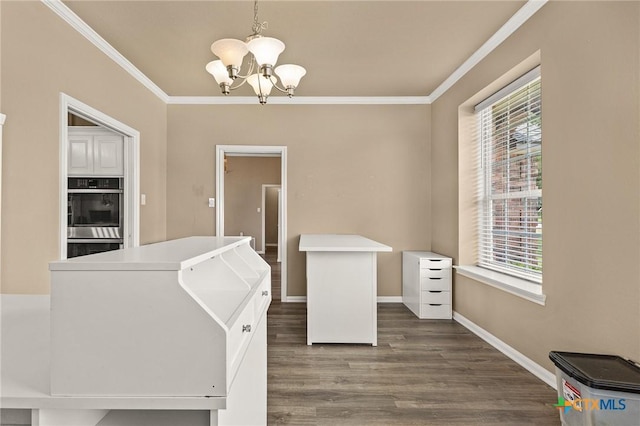 1205 Bowen Ave, Copperas Cove, TX 76522 - unfurnished dining area featuring a chandelier, crown molding, dark wood-style floors, and baseboards