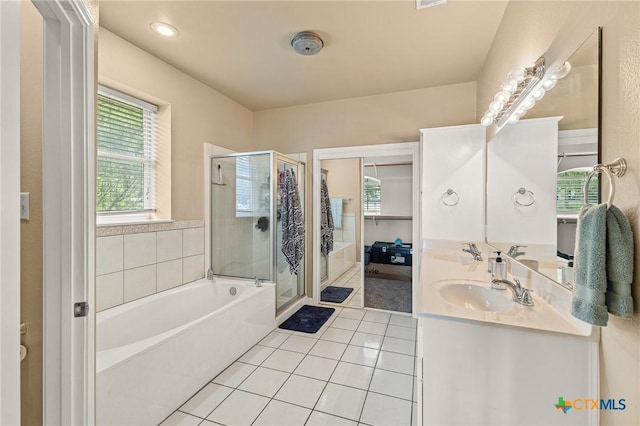 1205 Bowen Ave, Copperas Cove, TX 76522 - bathroom with tile patterned flooring, a stall shower, a garden tub, and double vanity