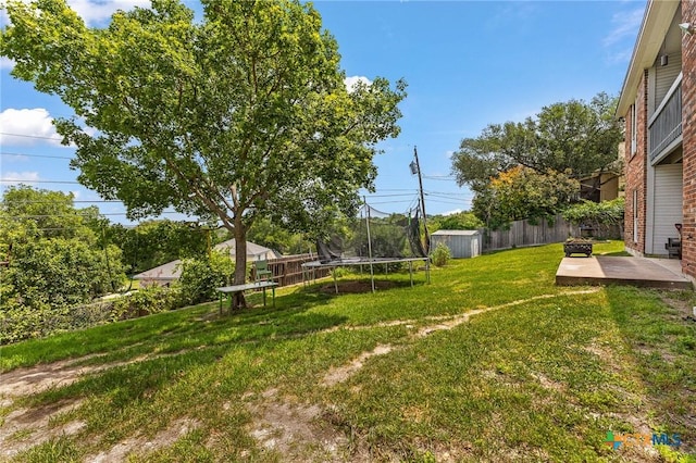 1205 Bowen Ave, Copperas Cove, TX 76522 - view of yard with a trampoline and a patio