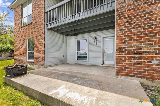1205 Bowen Ave, Copperas Cove, TX 76522 - view of patio featuring a balcony and a fire pit