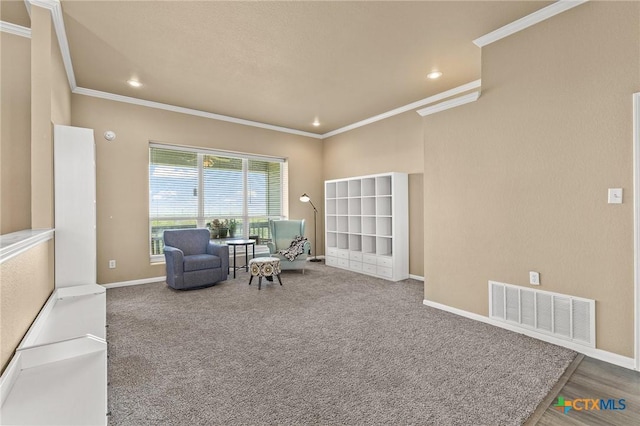 1205 Bowen Ave, Copperas Cove, TX 76522 - sitting room with crown molding, recessed lighting, baseboards, and carpet