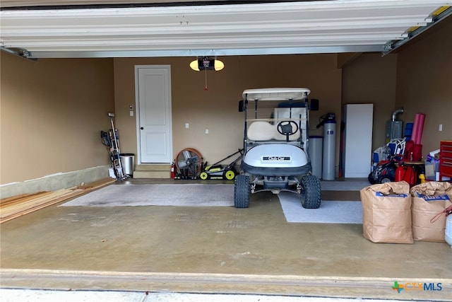 garage featuring a garage door opener